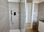 19. Renovated bathroom in Argegno apt for sale